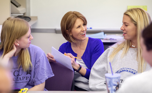 Professor Michelle Bauml with TCU College of Education students