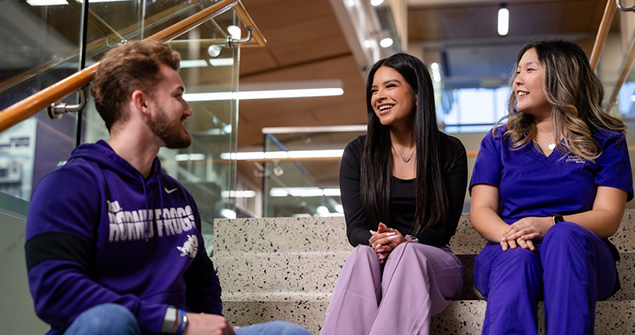 A group of Harris College of Nursing and Health Sciences students interact