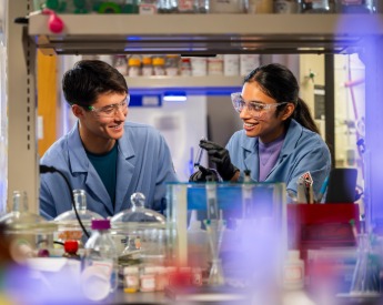 Two students working together in a Sid Richardson lab